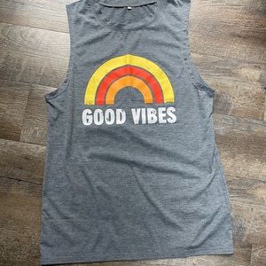 Good Vibes sleeveless shirt.
